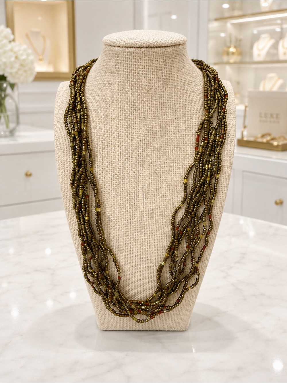 Multi-strand beaded necklace